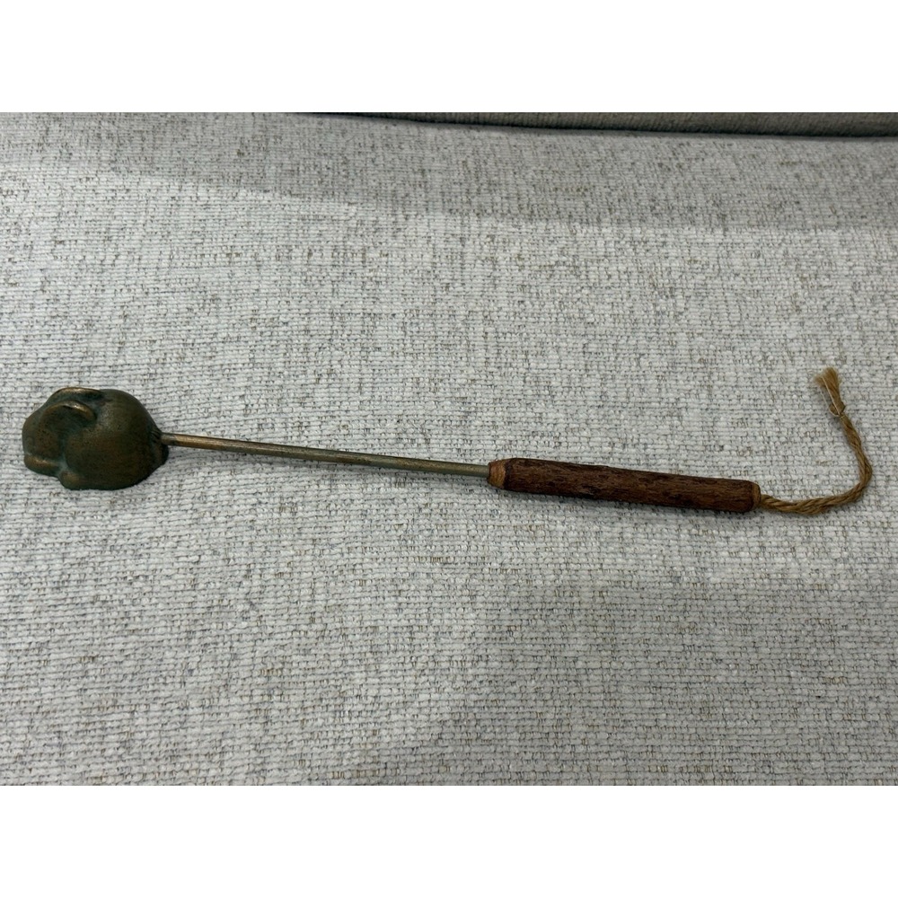 vintage brass candle Bunny snuffer with a wooden handle